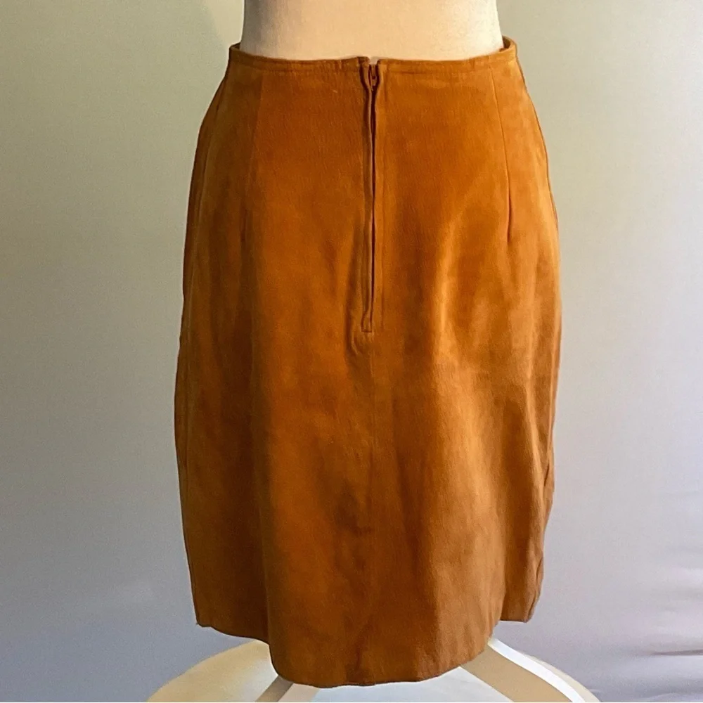 True vintage suede—real leather with clean tailoring an earlier designer era.